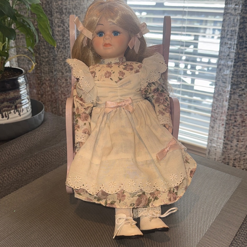 Vintage 15 Inch Porcelain Doll with Musical Rocking Chair